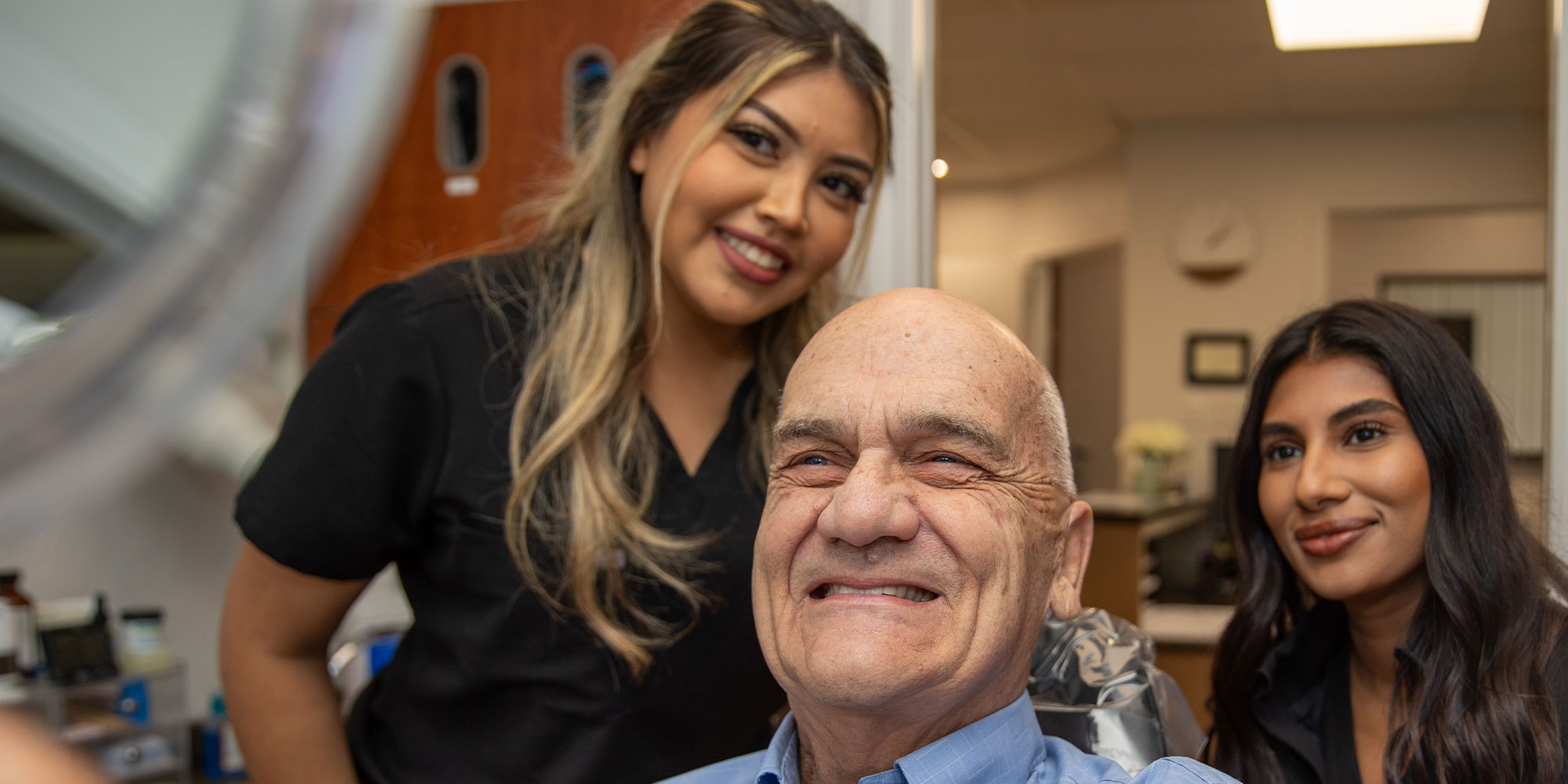 Patient Looking into Mirror with Doctor